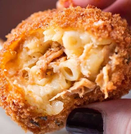 BBQ Pulled Pork Fried Mac and Cheese Bites | 5 cheese homemade Mac and cheese, slow cooker bbq pulled pork, combined and breaded in crispy spiced panko and fried until perfectly golden! | https://thechunkychef.com | #appetizer #gameday #tailgating #friedmacandcheese #pulledpork