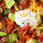 Classic Beef and Bean Slow Cooker Chili | Make classic beef and bean chili the easy way... in the slow cooker!  Come home to a big bowl of comfort food, or serve this chili at a game day party! | https://www.thechunkychef.com | #chili #slowcooker #crockpot #gameday 