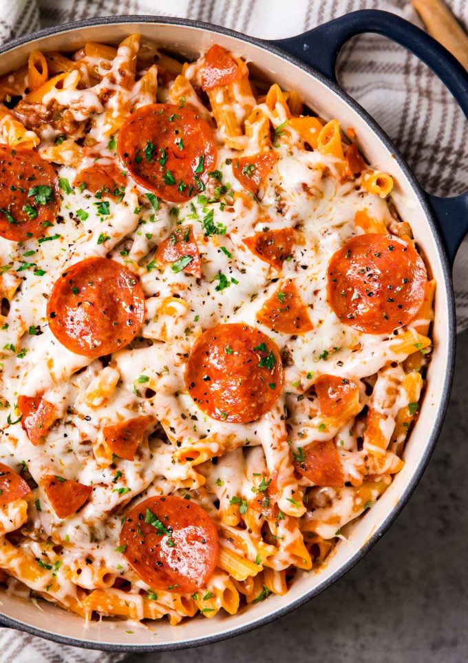 Pizza pasta in dutch oven with pepperoni and cheese