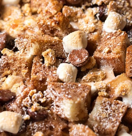 Overnight S'mores French Toast Casserole | Perfect for a holiday breakfast or brunch, sourdough bread is mixed with chocolate chips, marshmallows and graham crackers, then baked up into pure French toast perfection! | https://thechunkychef.com | #frenchtoast #breakfast #brunch #casserole