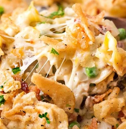 Loaded Cheesy Chicken Noodle Casserole | This chicken noodle casserole has great classic chicken noodle flavors, with some added flavors like bacon, mushrooms, and a crunchy fried onion topping!  Great for a make-ahead meal, this casserole will be family favorite! | The Chunky Chef | #chickennoodle #chickencasserole #casserole #makeahead #comfortfoods #weeknightmeals