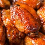 Slow Cooker Honey Buffalo Wings | Chicken wings are rubbed with spices, tossed in a sweet and spicy honey buffalo sauce, cooked in the slow cooker, then crisped up under the broiler for a finger-lickin' juicy hot wing!  Slow cooker wings are the way to go this game day season! | The Chunky Chef | #chickenwings, #hotwings #chickenwingrecipe #buffalo #honeybuffalo #slowcooker #crockpot #gamedayfood