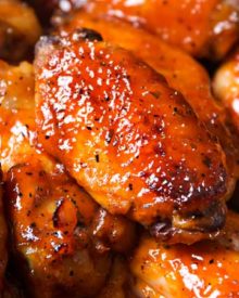 Slow Cooker Honey Buffalo Wings | Chicken wings are rubbed with spices, tossed in a sweet and spicy honey buffalo sauce, cooked in the slow cooker, then crisped up under the broiler for a finger-lickin' juicy hot wing! Slow cooker wings are the way to go this game day season! | The Chunky Chef | #chickenwings, #hotwings #chickenwingrecipe #buffalo #honeybuffalo #slowcooker #crockpot #gamedayfood