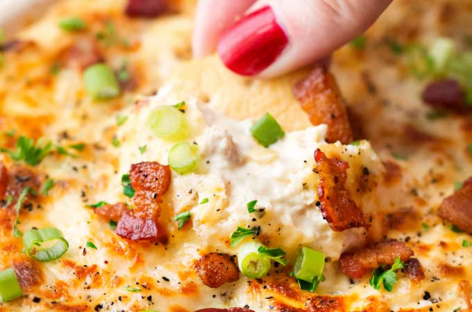 Bacon Horseradish Baked Clam Dip | This 5 ingredient clam dip is loaded with bold flavors and is incredibly easy to make for a party! | The Chunky Chef | #clamdip #bakedclamdip #partyfood #holidaydip #diprecipes