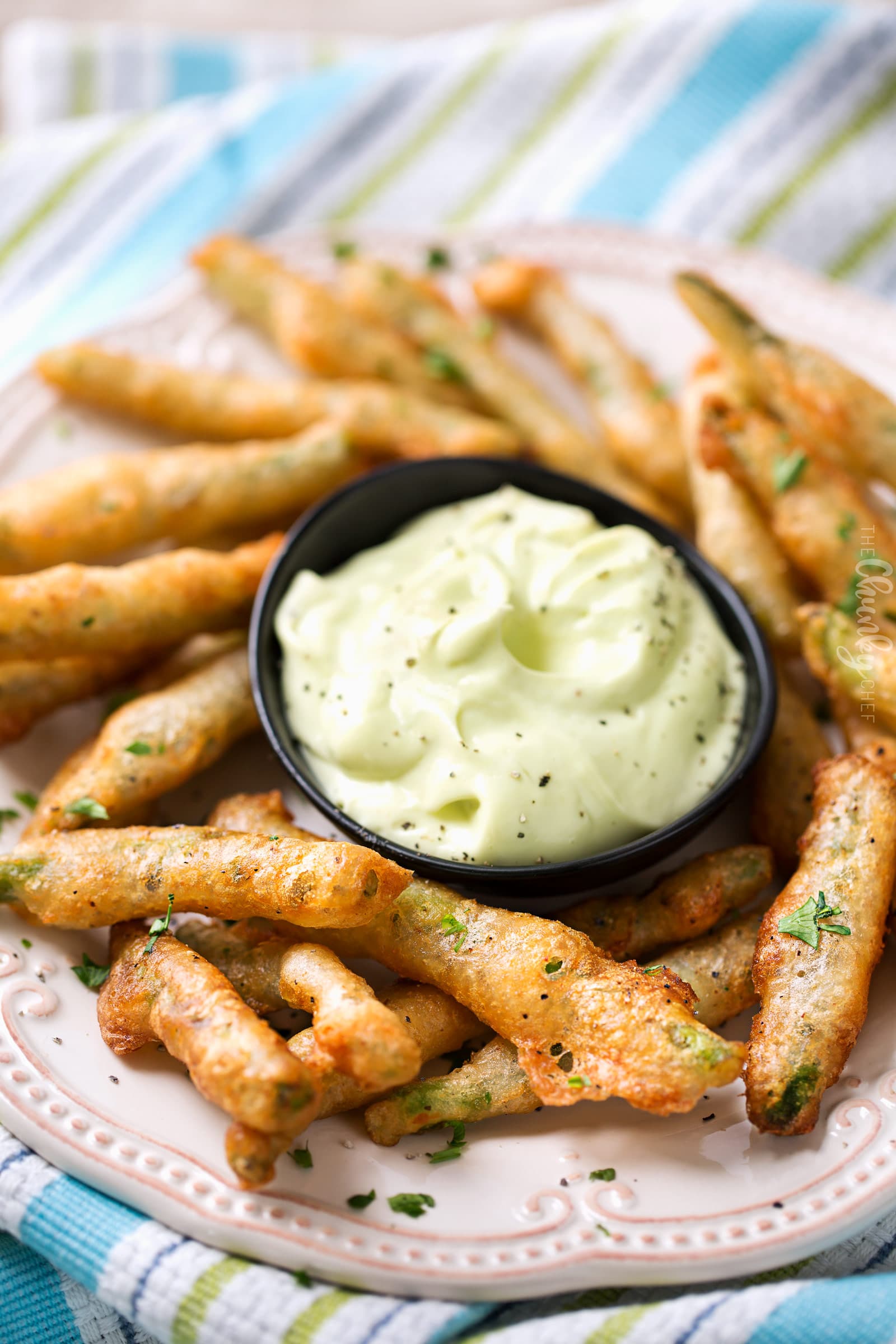 Beer Battered Fried Green Beans | The perfect appetizer or snack food, these crispy green bean "fries" are tender, crispy, yet surprisingly light thanks to the beer batter!  Dipped in creamy ranch or wasabi mayo, they're a crowd-pleaser! | The Chunky Chef | #partyfood #appetizer #greenbeans #friedgreenbeans #greenbeanfries #beerbattered