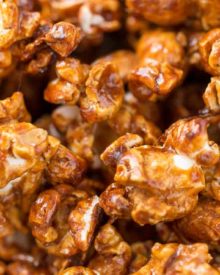 Gingerbread Caramel Corn | Classic caramel corn combines with gingerbread spices in the best caramel corn EVER! You'll love snacking on this sweet and crunchy popcorn! | The Chunky Chef | #popcorn #caramelcorn #homemadecaramel #snackrecipes #homemade #gingerbread