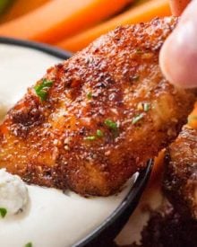 Epic Dry-Rubbed Baked Chicken Wings | Extremely tender and juicy, these baked chicken wings are rubbed with the most epic dry rub made right from your spice cabinet! You won't miss the deep fryer or the sauce, I guarantee it!! | The Chunky Chef | #chickenwings #chickenwingrecipes #bakedhotwings #bakedwings #dryrub #gamedayfood #partyfood