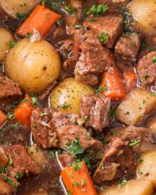 Beer and Horseradish Slow Cooker Beef Stew | This slow cooker beef stew simmers all day to create the most hearty, comforting and flavorful beef stew of all time! The flavors are enhanced by using beer and finishing the dish with a kick of horseradish. | The Chunky Chef | #beefstew #beefstewrecipe #slowcookerbeefstew #crockpot #slowcooker #comfortfoods