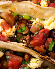 Chorizo and Potato Breakfast Tacos | Charred soft tortillas loaded with spicy chorizo, crispy potatoes, scrambled eggs and smothered in homemade salsa. The BEST way to start off your day! | The Chunky Chef | #tacos #breakfast #chorizo #potato #eggs #breakfastrecipes