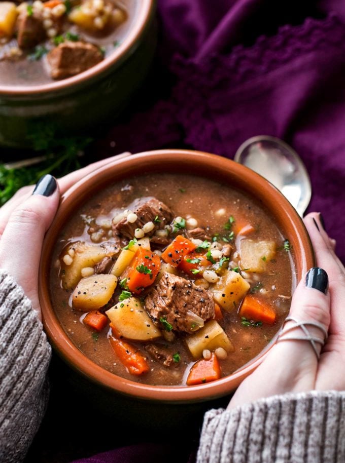 Hearty and positively soul-warming, this beef barley soup simmers all day in the slow cooker, which makes for an incredibly rich soup recipe! #beefbarley #soup #slowcooker #crockpot #comfortfood #barley #beefsoup #easyrecipe #dinner