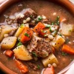 Hearty and positively soul-warming, this beef barley soup simmers all day in the slow cooker, which makes for an incredibly rich soup recipe! #beefbarley #soup #slowcooker #crockpot #comfortfood #barley #beefsoup #easyrecipe #dinner