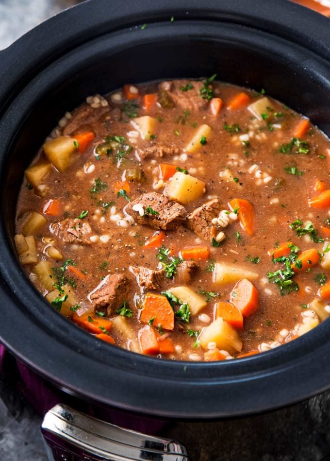 Slow cooker full of beef barley soup recipe