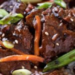 Easy Slow Cooker Mongolian Beef | Amazingly tender Mongolian beef, made incredibly easy in the slow cooker!  Just 10 minutes of prep! | The Chunky Chef | #mongolianbeef #slowcooker #crockpot #easyrecipe #chinesefood #beefrecipes