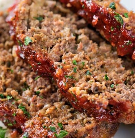 Glazed Chipotle Meatloaf Recipe | Not your average meatloaf recipe, this glazed chipotle meatloaf is packed with bold flavors like chipotle peppers, pepper jack cheese, chili powder and cumin!  Slow cooker instructions too! | The Chunky Chef | #meatloaf #beefrecipes #groundbeefrecipes #chipotle #spicy #comfortfood #meatloafrecipe