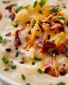 Skinny Slow Cooker Potato Soup | Thick, creamy and rich, yet surprisingly low in calories! This lightened up version of the ultimate comfort food is perfect for warming you up on a cold night! | The Chunky Chef | #potatosoup #souprecipe #loadedpotato #slowcookerrecipes #crockpot