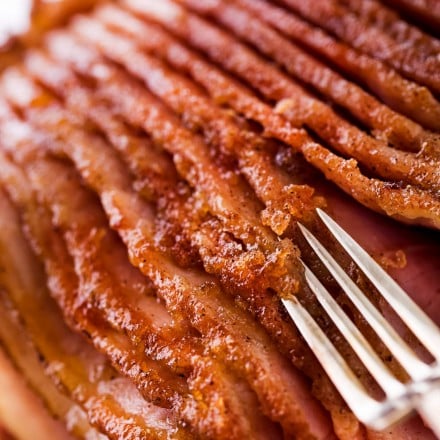 Fork showing the crispy sugar glaze on ham