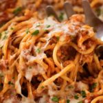 This Crockpot Spaghetti Casserole is every bit as tasty as it is easy!  Even the pasta cooks right in the slow cooker alongside the flavorful meat sauce, making this the ultimate weeknight meal! | #spaghetti #casserole #crockpot #slowcooker #Italianfood #weeknightmeal