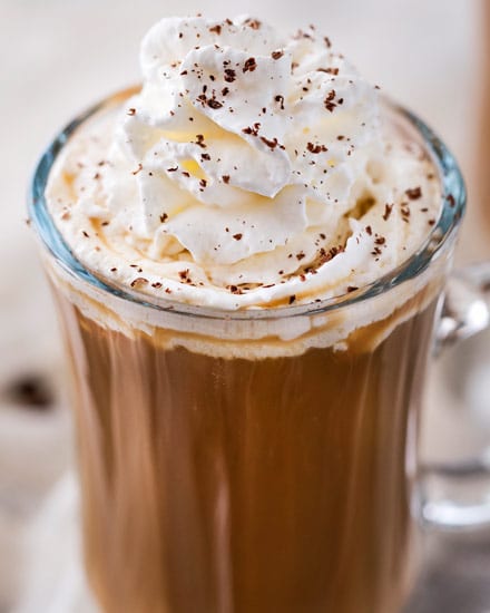 Irish Coffee is made with black coffee, Irish whiskey, Baileys, and brown sugar.  Classic Irish coffee, with an Irish cream twist – perfect for St. Patrick’s Day or an after dinner cocktail! #coffee, #Irish, #StPatricksDay #irishcoffee #baileys #whiskey #boozycoffee #cream #irishcream