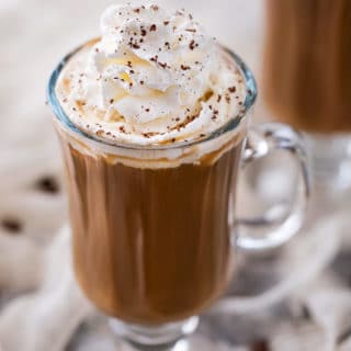 Irish Coffee is made with black coffee, Irish whiskey, Baileys, and brown sugar. Classic Irish coffee, with an Irish cream twist – perfect for St. Patrick’s Day or an after dinner cocktail! #coffee, #Irish, #StPatricksDay #irishcoffee #baileys #whiskey #boozycoffee #cream #irishcream
