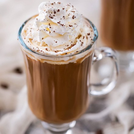 Irish Coffee is made with black coffee, Irish whiskey, Baileys, and brown sugar.  Classic Irish coffee, with an Irish cream twist – perfect for St. Patrick’s Day or an after dinner cocktail! #coffee, #Irish, #StPatricksDay #irishcoffee #baileys #whiskey #boozycoffee #cream #irishcream