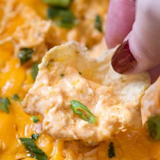 Slow Cooker Buffalo Chicken Dip Recipe | Classic buffalo wing flavors in an easy dip made in the crockpot. Perfect for a party, serve it up with chips or celery sticks and watch everyone go back for seconds! | The 5 o'clock Chef | #diprecipe #buffalochicken #slowcookerdip #crockpotdip #partyfood #buffalochickendip