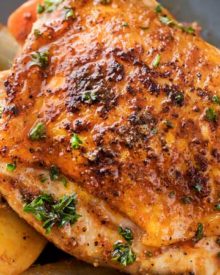 This slow cooker Harissa chicken is absolutely brimming with bold, spicy flavors! Chicken thighs, potatoes, carrots, and onion are slathered in a rich spice mix and then made easily in the crockpot! | #slowcooker #crockpot #chickenrecipes #harissa #weeknightmeal
