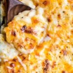 Rich and creamy homemade baked mac and cheese, filled with multiple layers of shredded cheeses, smothered in a smooth cheese sauce, and baked until bubbly and perfect! #macandcheese #comfortfood #macaroni #cheese #sidedish #comfortfood #holidayfood