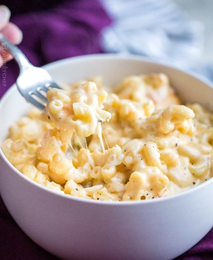 Forkful of cheesy mac and cheese