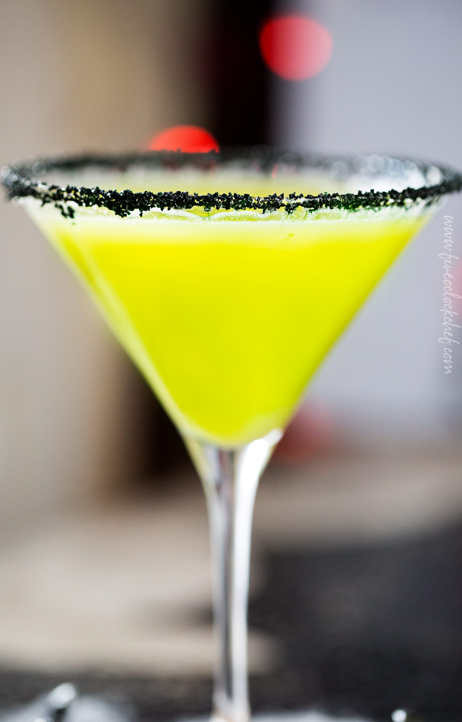 Witches Brew Halloween Cocktail | Sweet and mysterious, this Halloween cocktail practically glows with an eerie greenish color! Made with just 3 simple ingredients, it's a must make for any party! | https://www.the5oclockchef.com | #cocktail #halloween #witch #partydrink #midori