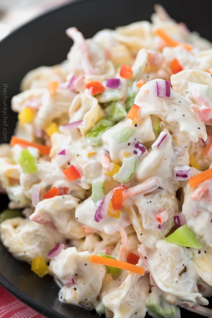 Creamy tortellini salad, loaded with colorful vegetables and tossed in a deliciously sweet and tangy dressing! 