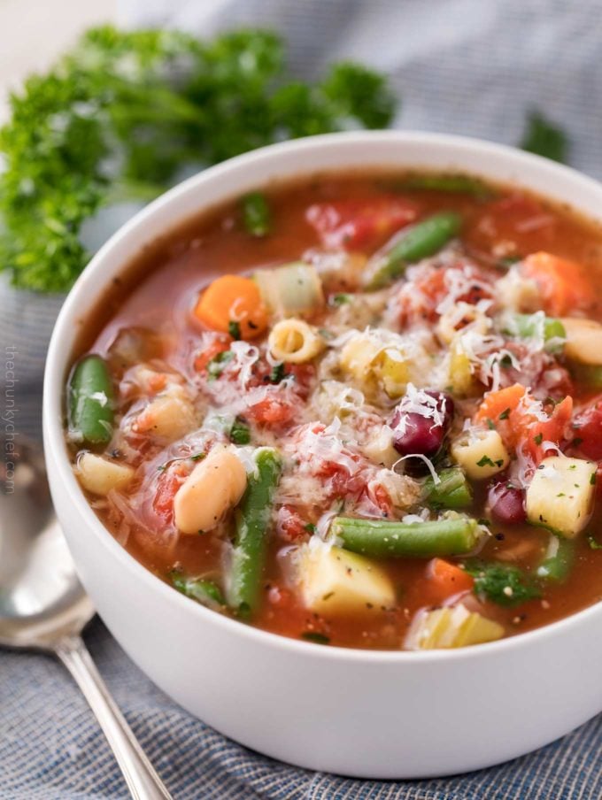 Bowl of minestrone with parmesan cheese on top