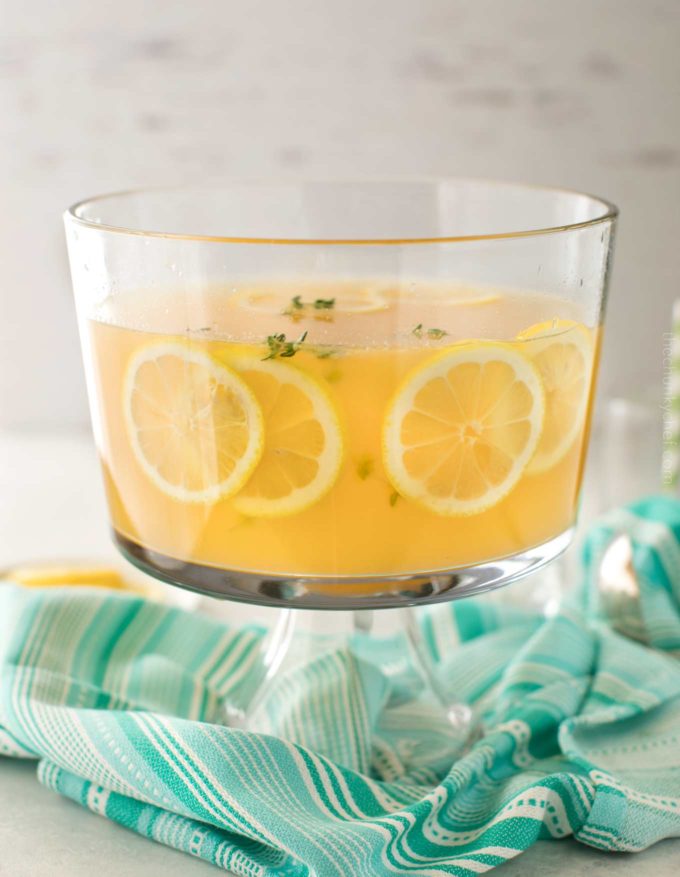Peach homemade lemonade in punch bowl