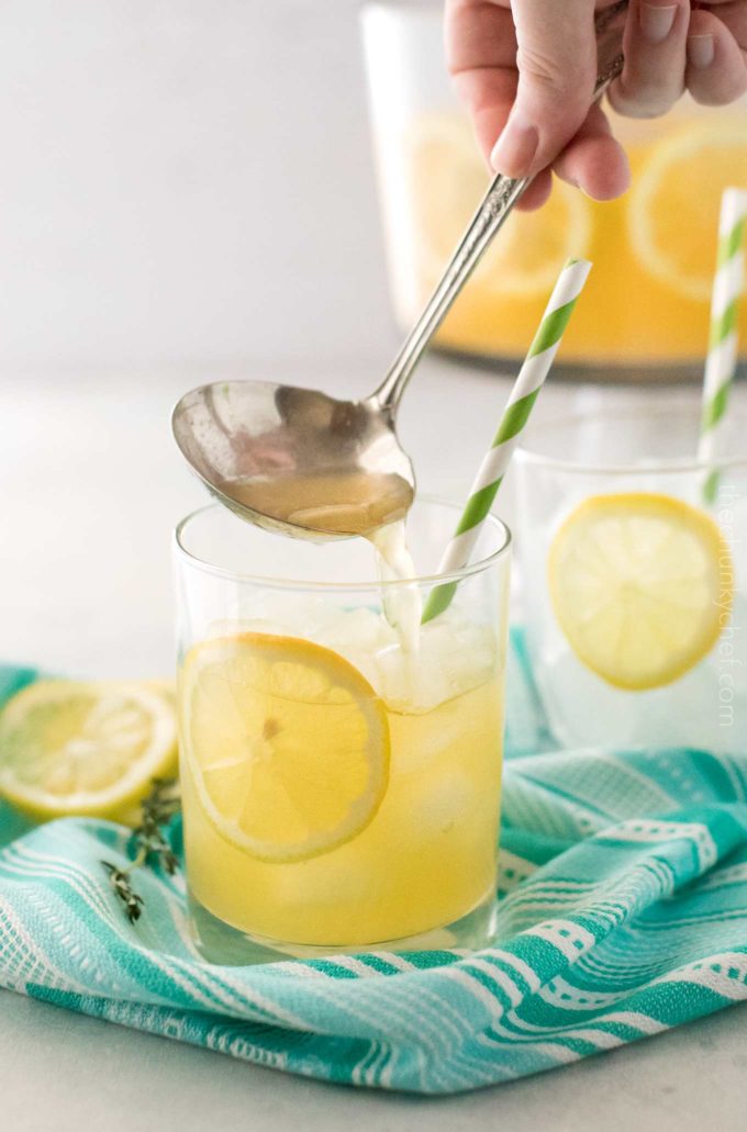 Ladling lemonade into serving glass