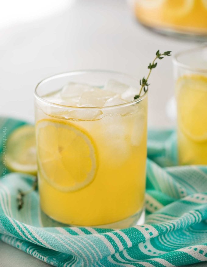Sweet summer peach lemonade, made with just a few simple ingredients!  Perfect on a hot Spring or Summer day, it's the ultimate thirst-quencher! 