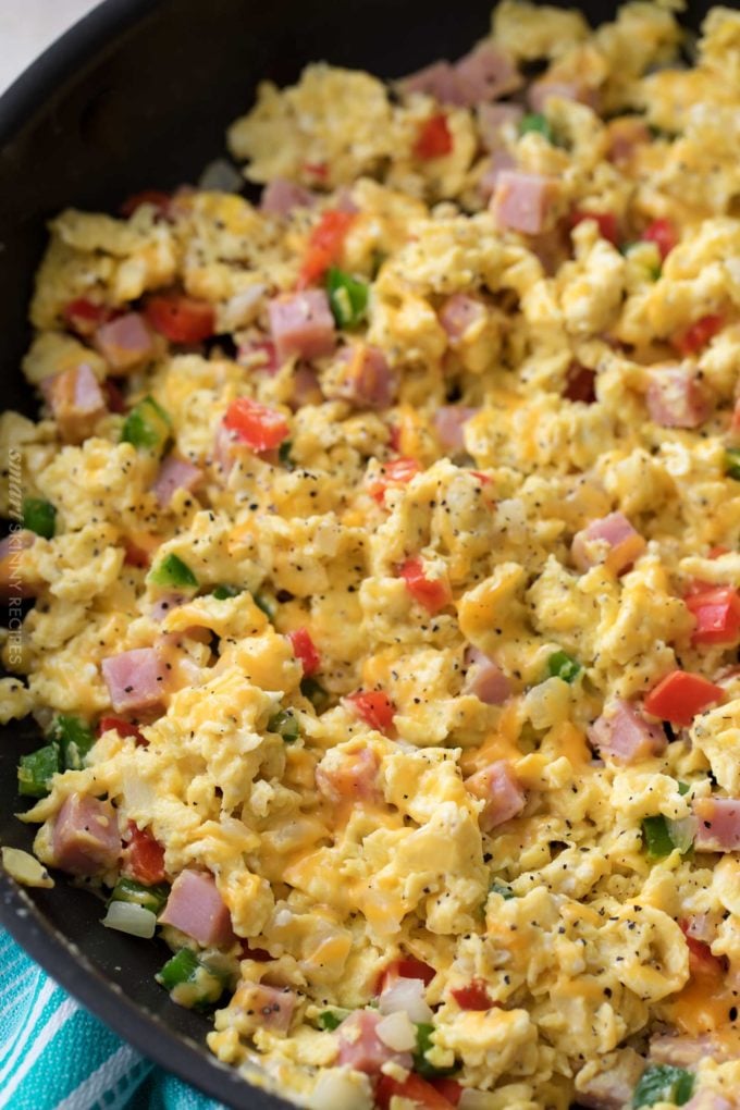 Scrambled egg in small cast-iron skillet. Making omelet eggs. Stock Photo  by ©boomeart 327353544