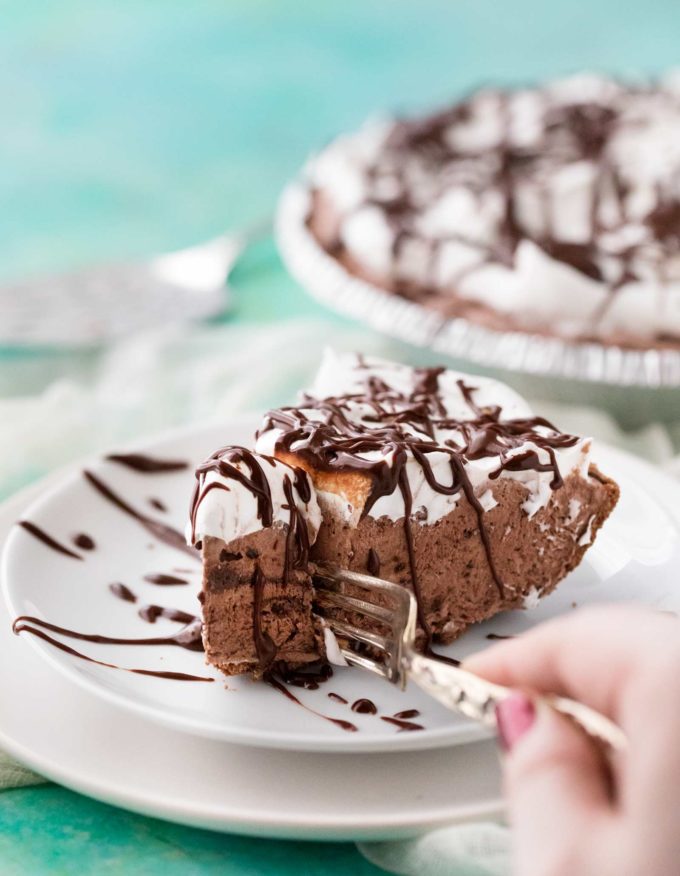 Fork taking a bite of frozen chocolate pie