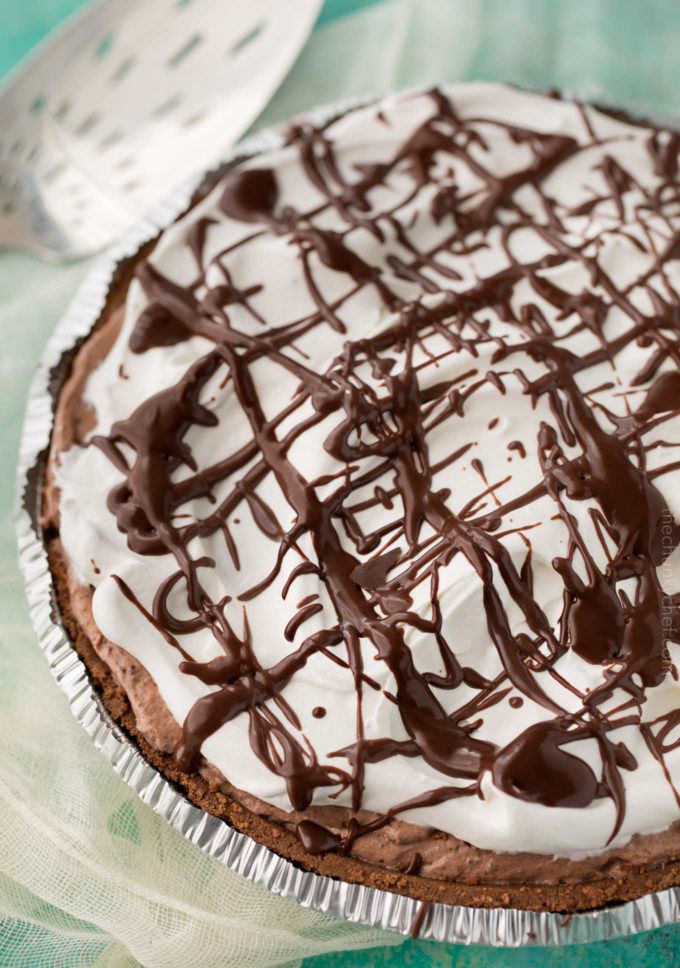 Whole no bake chocolate pie with chocolate sauce