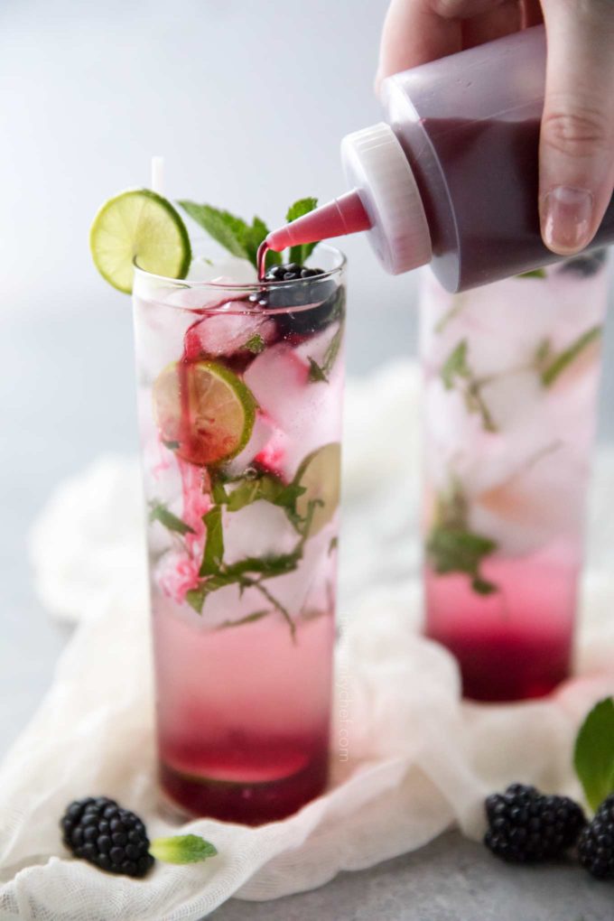 Adding blackberry simple syrup to mojito