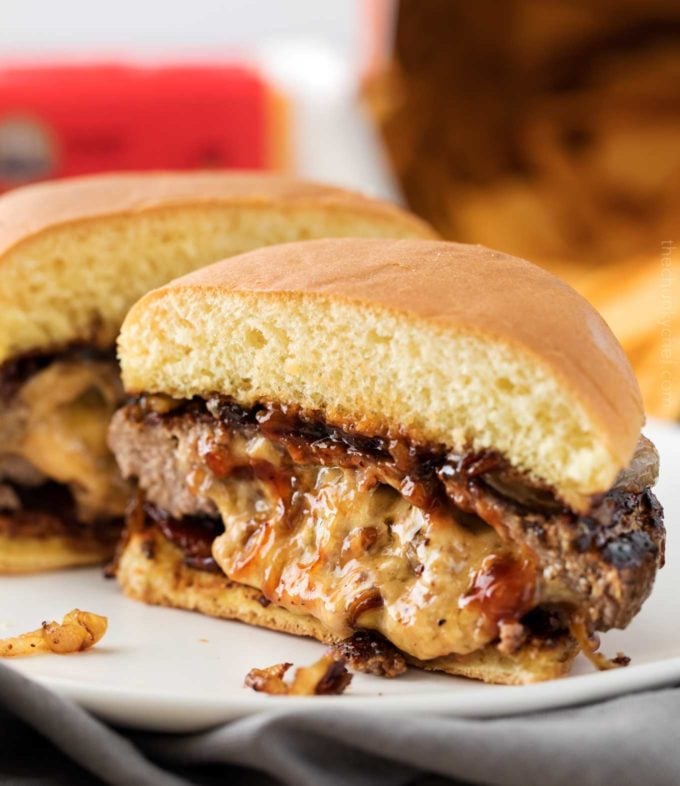 This classic Juicy Lucy burger is a well known Midwestern recipe.  Definitely not your average cheeseburger, this burger recipe is stuffed with caramelized onions and cheddar cheese!  Our favorite version also includes crispy bacon and smoky bbq sauce!