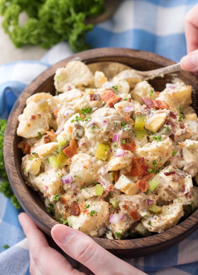 Potato salad in wooden bowl