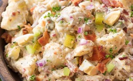 This summertime staple is truly my FAVORITE potato salad recipe!  Plus tips on how to get the perfect potato texture, prevent a "wet" potato salad, and how to add extra zing that will make everyone want the recipe! | #potatosalad #potluckrecipe #summer #salad #sidedish #picnic