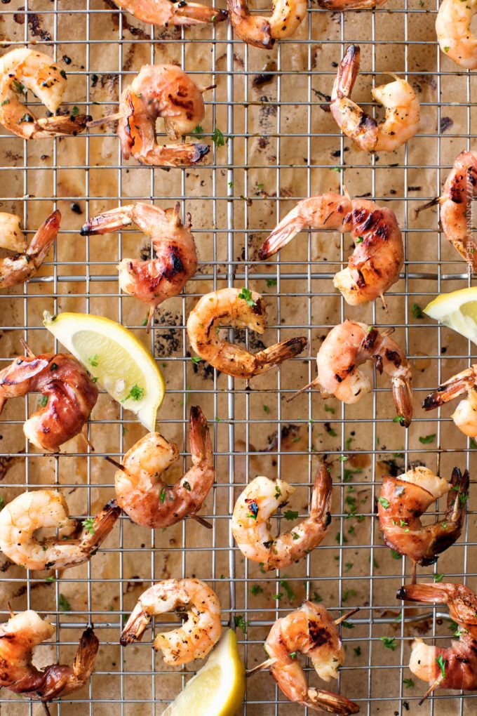 Prosciutto wrapped honey lemon shrimp on baking sheet