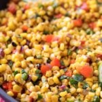 This Southwest cilantro lime corn salad is bold, healthy, and incredibly versatile!  At zero smart points per serving, feel free to pile it on tacos for an amazing meal! | #cornsalad #mexican #southwest #cilantro #lime #tacotuesday