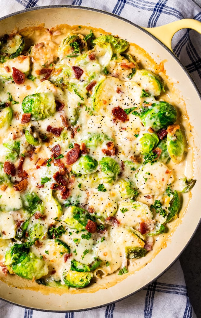 Sprouts in skillet with cheese and bacon