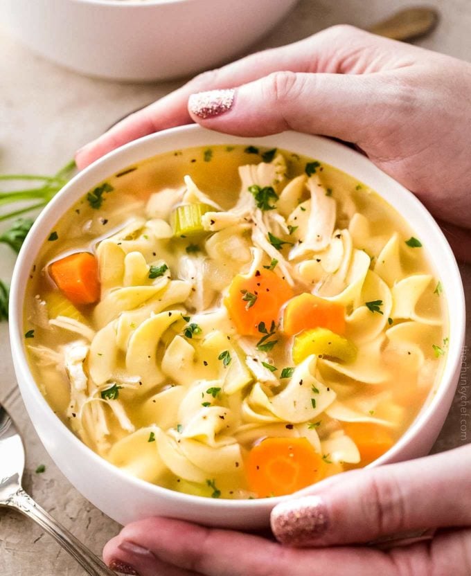 Guaranteed to warm you from the inside out, this homemade chicken noodle soup is made in the crockpot for an ultra-easy home-cooked meal that will feed your soul! #chickennoodlesoup #crockpotrecipe #slowcookermeal #chickennoodle #souprecipe #chickensoup