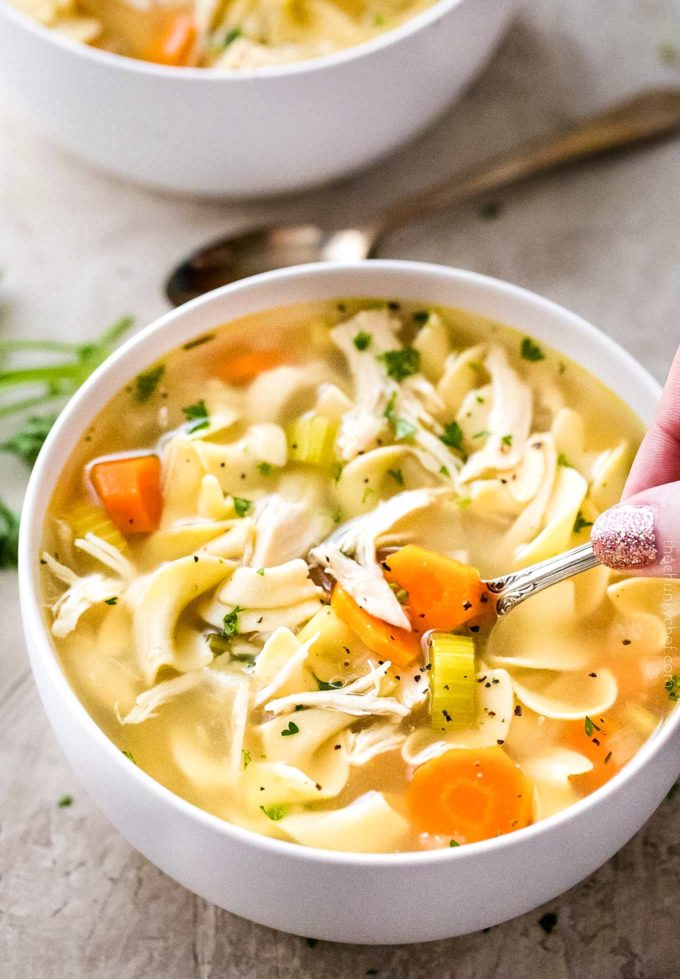 Spoonful of hearty chicken noodle soup