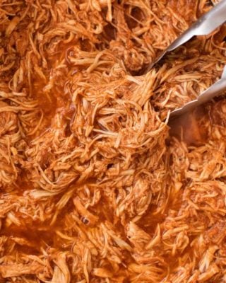 Incredible pulled BBQ chicken made easy in the crockpot... made from scratch with no bottled bbq sauce! Perfect for a summer bbq or picnic! | #bbqchicken #pulledchicken #crockpotchicken #weightwatchers #freestyle #smartpoints