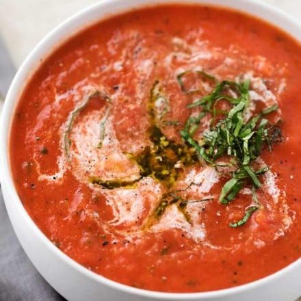 This tomato basil soup takes only 15 minutes to make, yet is positively bursting with flavors you'd expect from a soup that's been simmering all day!