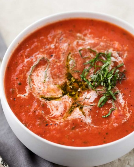 This tomato basil soup takes only 15 minutes to make, yet is positively bursting with flavors you'd expect from a soup that's been simmering all day!