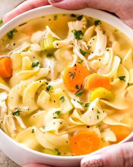Guaranteed to warm you from the inside out, this homemade chicken noodle soup is made in the crockpot for an ultra-easy home-cooked meal that will feed your soul! #chickennoodlesoup #crockpotrecipe #slowcookermeal #chickennoodle #souprecipe #chickensoup